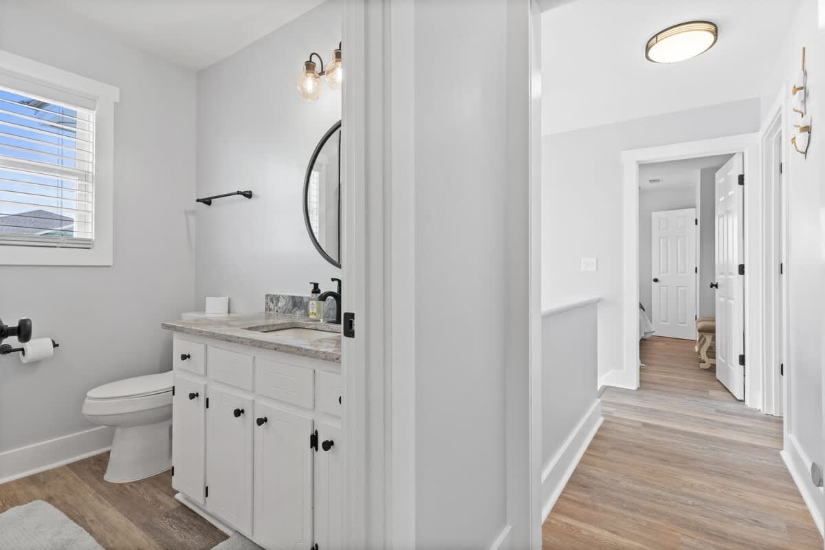 Bright space with sleek fixtures and stylish lighting for your refreshing retreat!