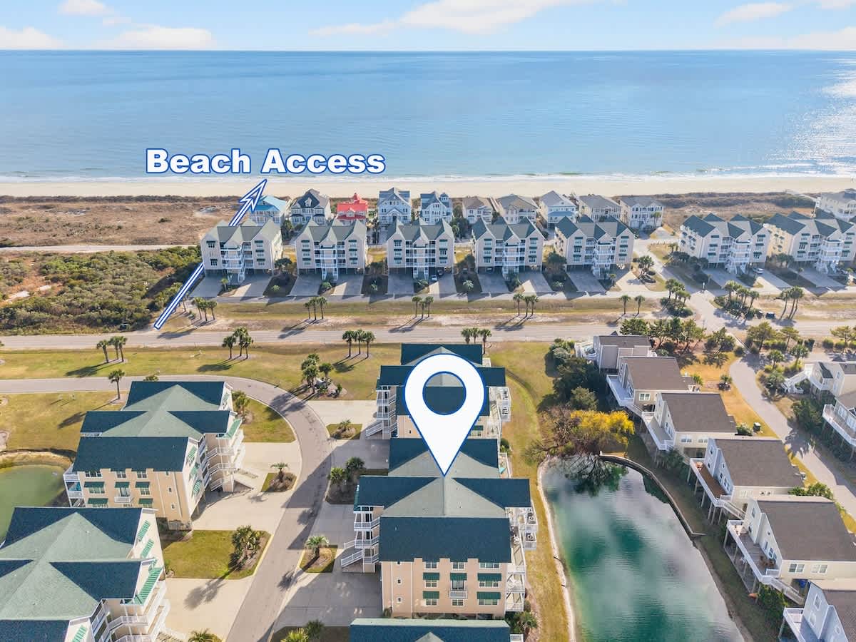 Bright, coastal condo exterior just minutes from the sand and surf.