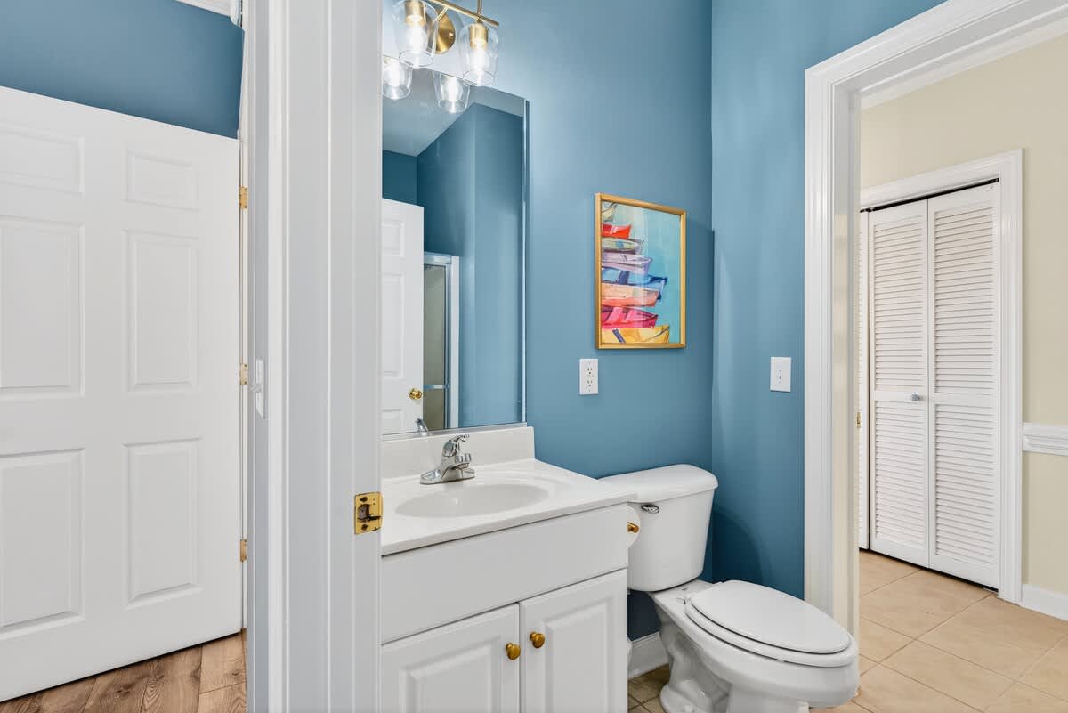 Bright full bathroom with everything you need to start the day fresh.