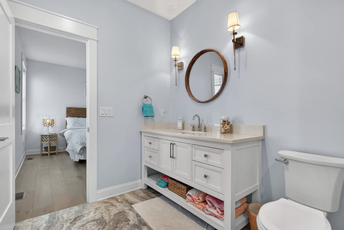 Each bedroom’s ensuite bath offers privacy and convenience for guests.