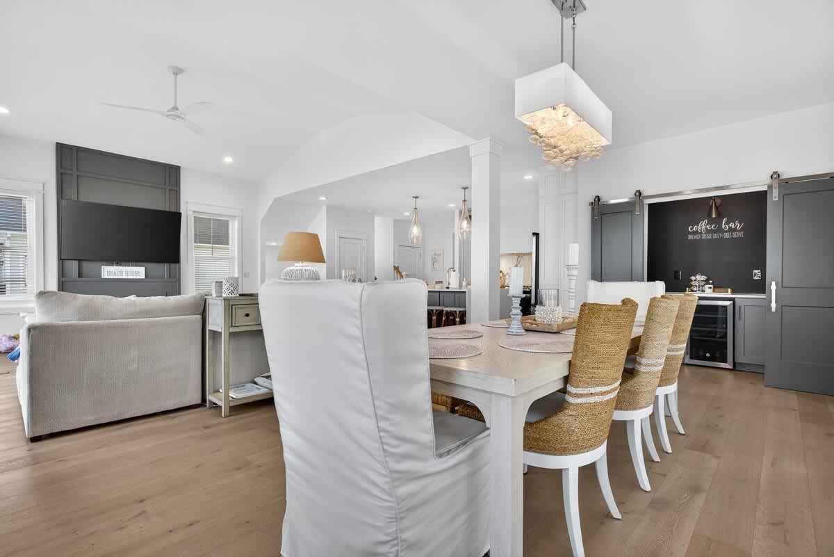 Open dining area keeps everyone connected from table to deck.