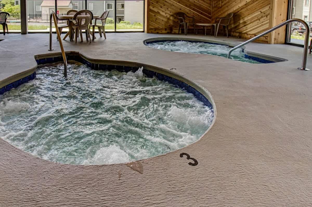Unwind in bubbling bliss while enjoying views of the serene Gatlinburg landscape!