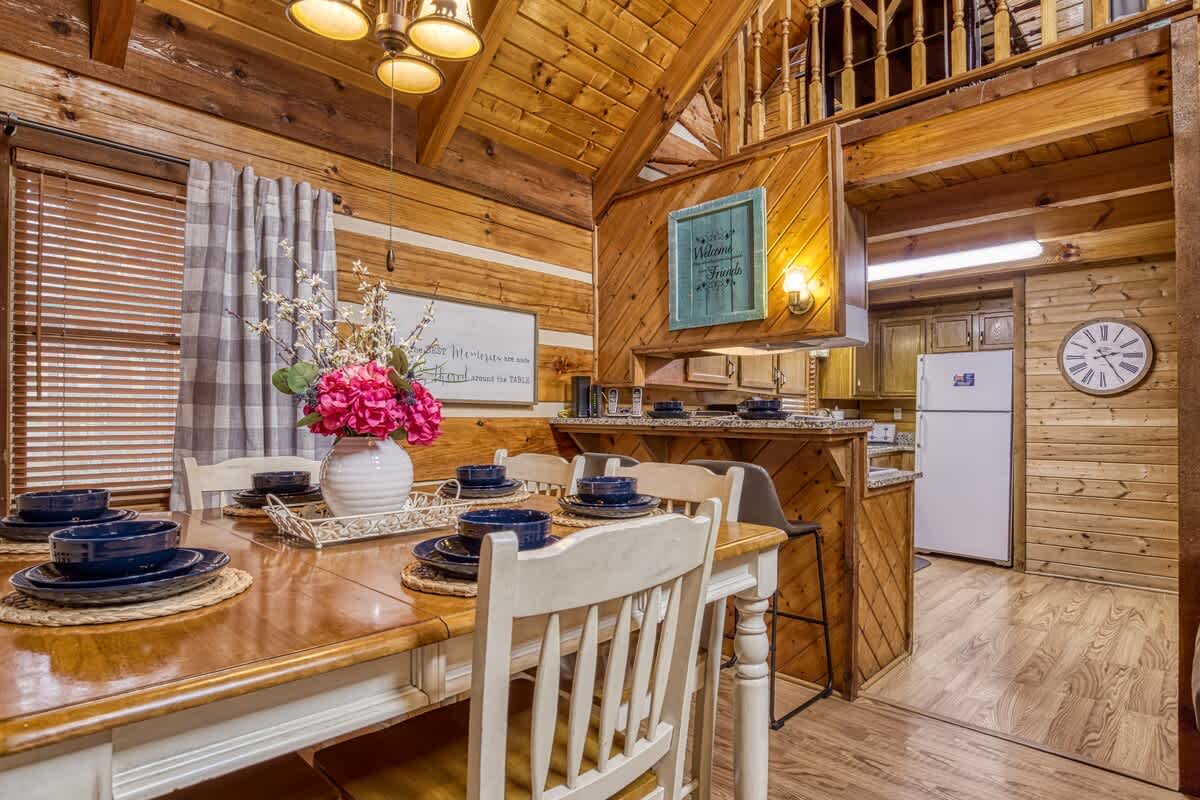 Dining Area: Gather around the rustic table for memorable meals and laughter in this charming space!