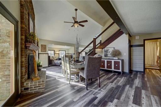  Gather around the elegant table under soaring ceilings and a charming fireplace!