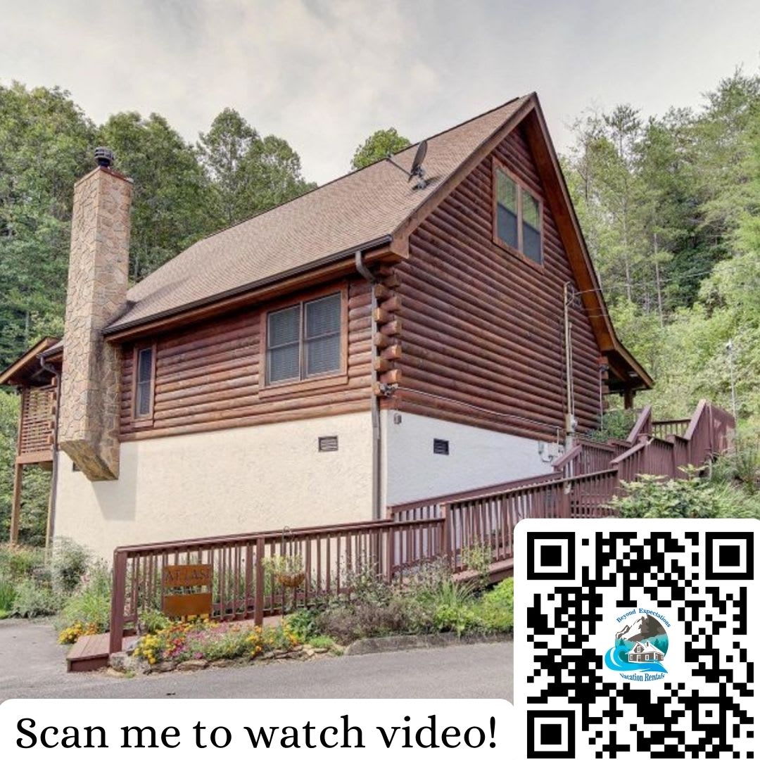  Enjoy the mountain views from your spacious log cabin retreat!