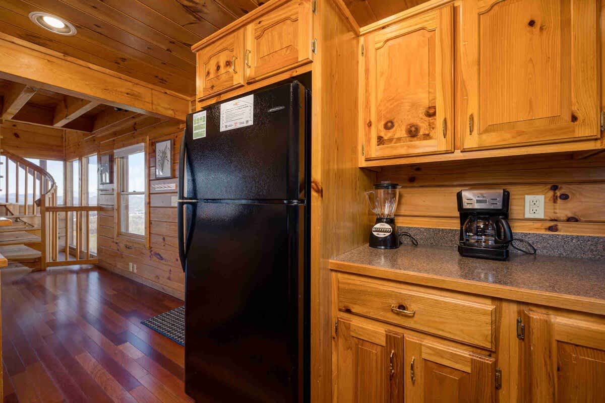 Full-size fridge plus blender and coffee maker for all your kitchen needs.