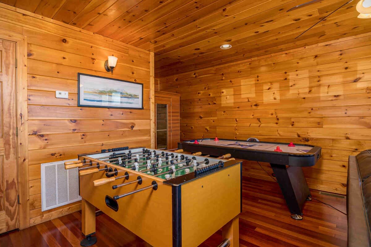 Endless fun in the game room with pool table, foosball, and air hockey.