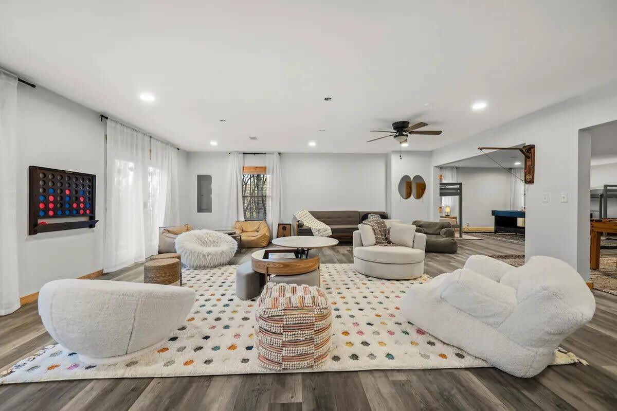 Bright space with playful seating, perfect for game nights and relaxation!