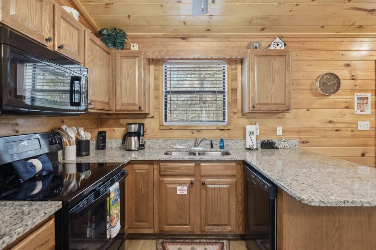 Rustle up memories in this charming space with modern appliances and serene forest views!