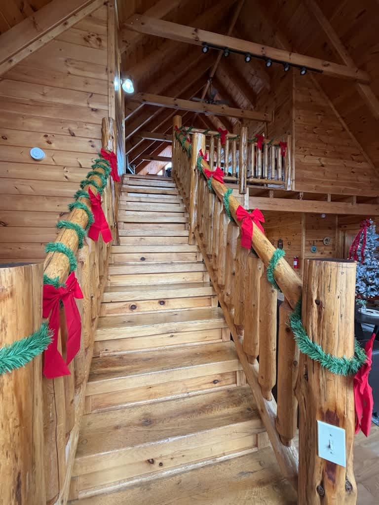 Stairway to Serenity: Ascend to your mountain getaway adorned with festive charm!
