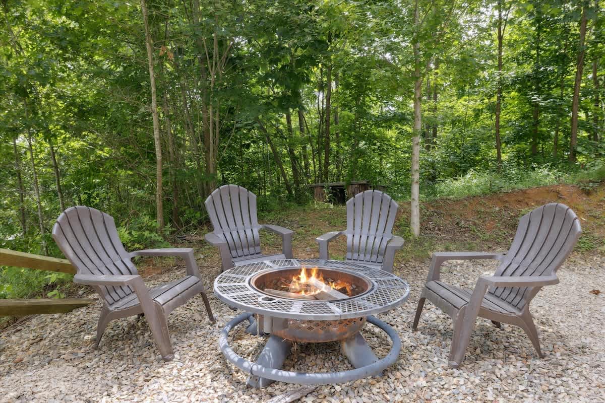 Fire Pit Retreat: Gather around the fire pit and enjoy nature under the stars!