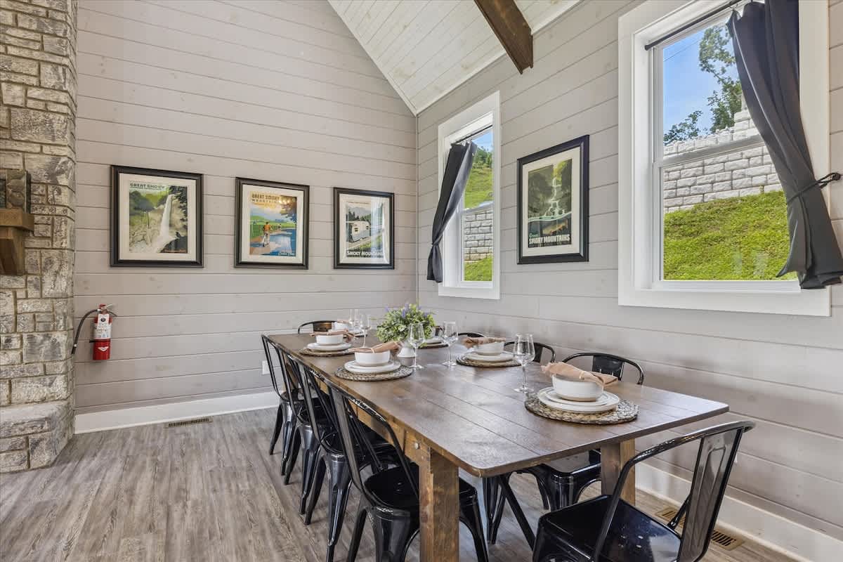  Gather around the stylish table with stunning mountain views and delightful decor!
