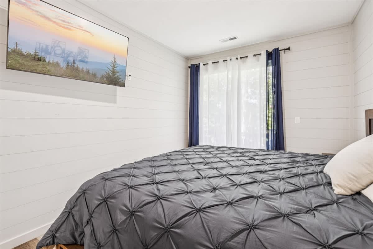 Bedroom Retreat: Relax in style with scenic views, chic decor, and a restful vibe!