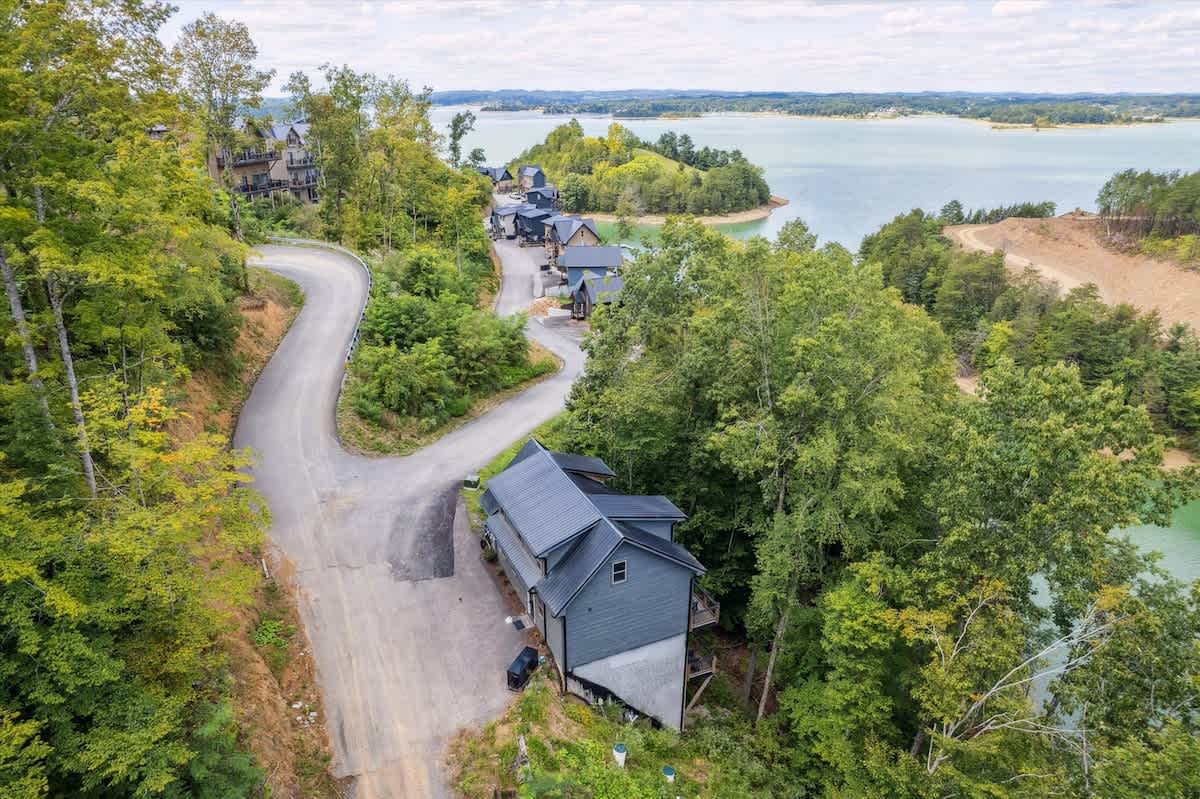  Nestled among lush trees, this retreat offers stunning water views and adventure!