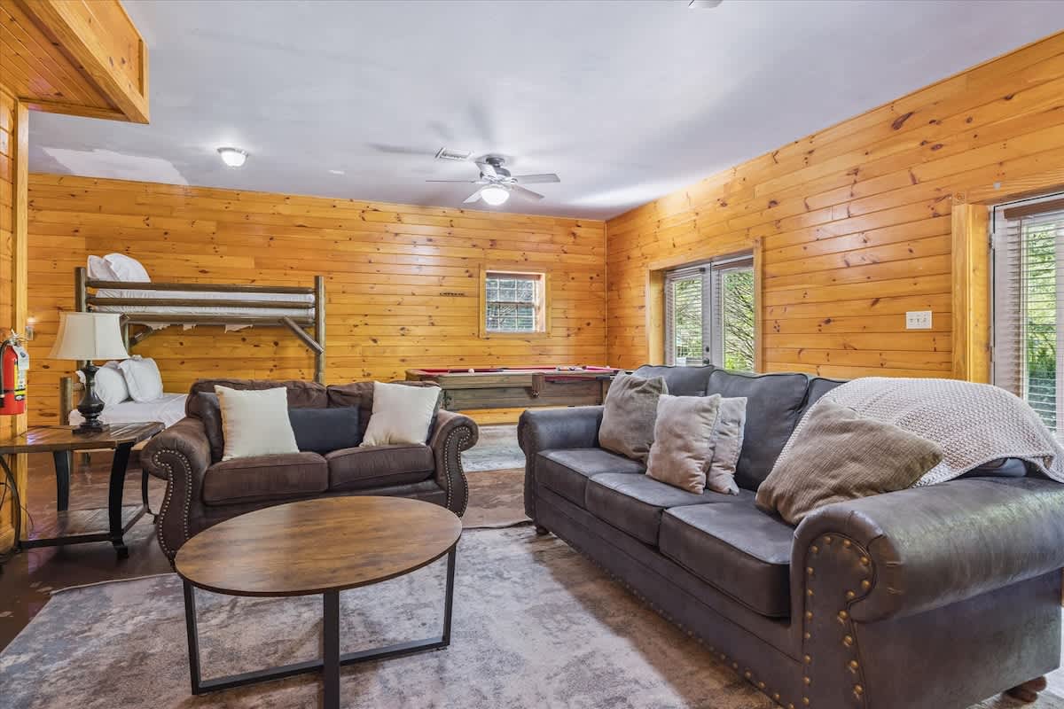  Relax in style with plush seating and charming wooden accents!