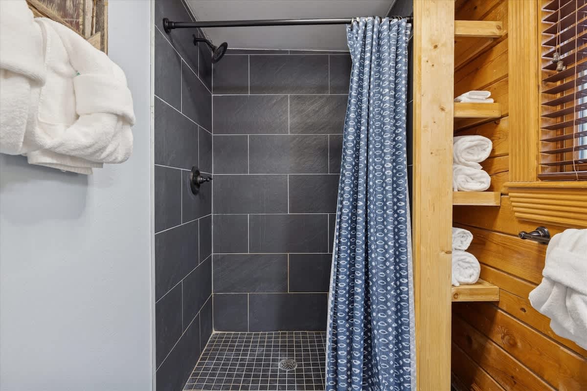 Upstairs bathroom —bright, clean, and stocked with fresh towels for your comfort.