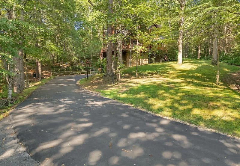 Spacious driveway at Black Bearry Hill by Beyond Expectations—ample parking for your family getaway.