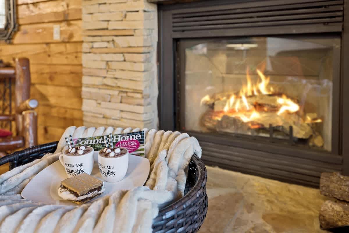 Cozy up by the warm gas fireplace in the inviting living room.