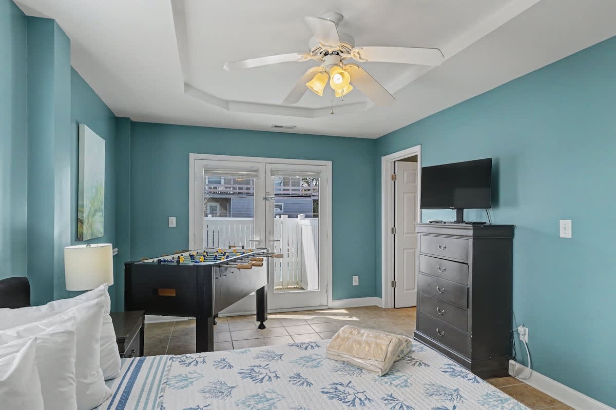 Spacious bedroom with cozy queen bed