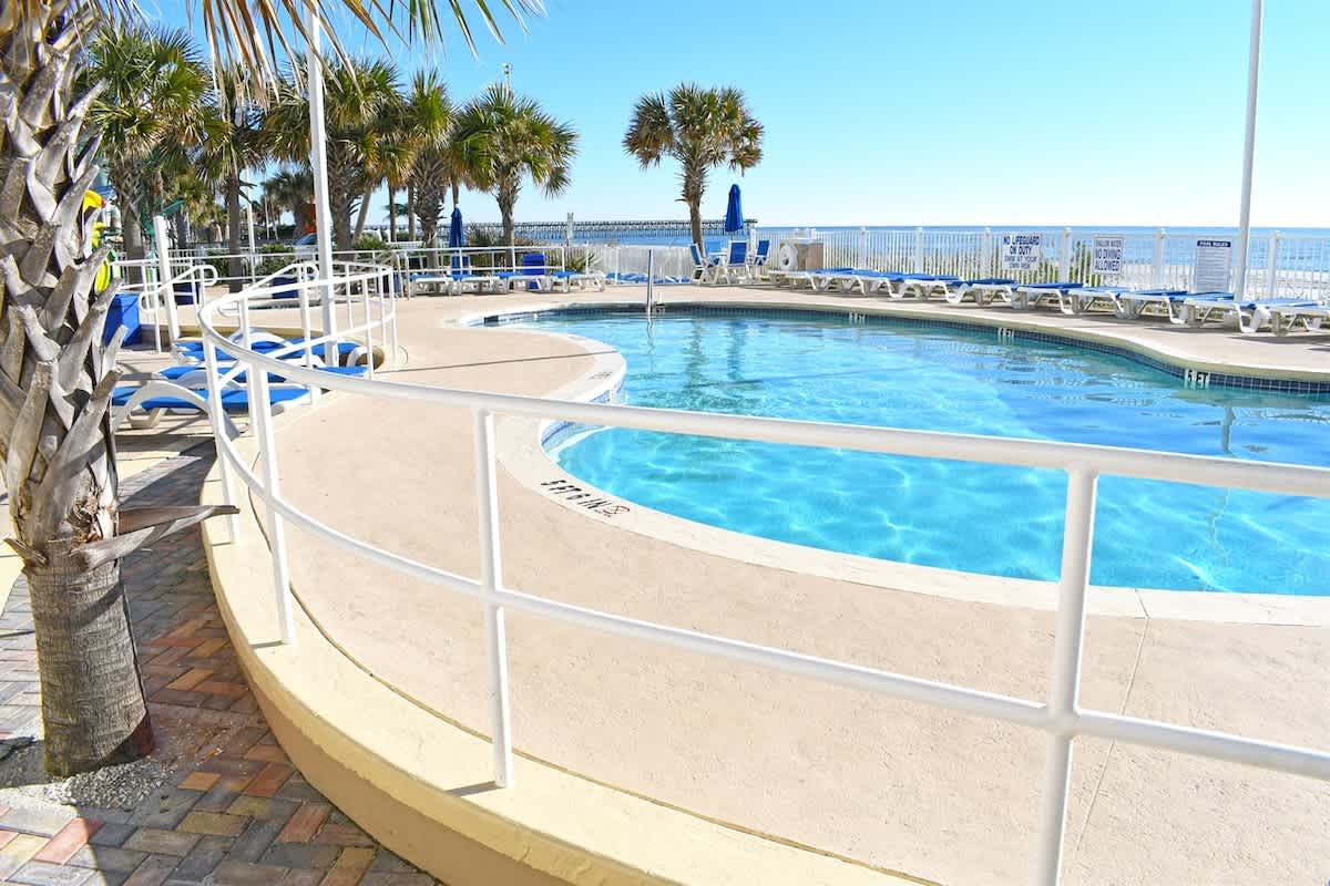 - Outdoor pool with ocean views and plenty of lounge seating provided   - Perfect spot to swim, sunbathe, and enjoy the Myrtle Beach sunshine   - Resort style pool area enhances your oceanfront vacation experience