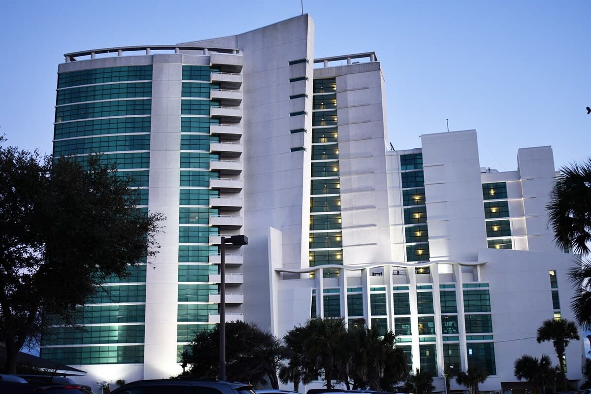 - Exterior view of Sandy Beach Resort’s modern high-rise design   - Towering oceanfront building offers stunning Atlantic views   - Stay steps away from the beach in a stylish Myrtle Beach resort