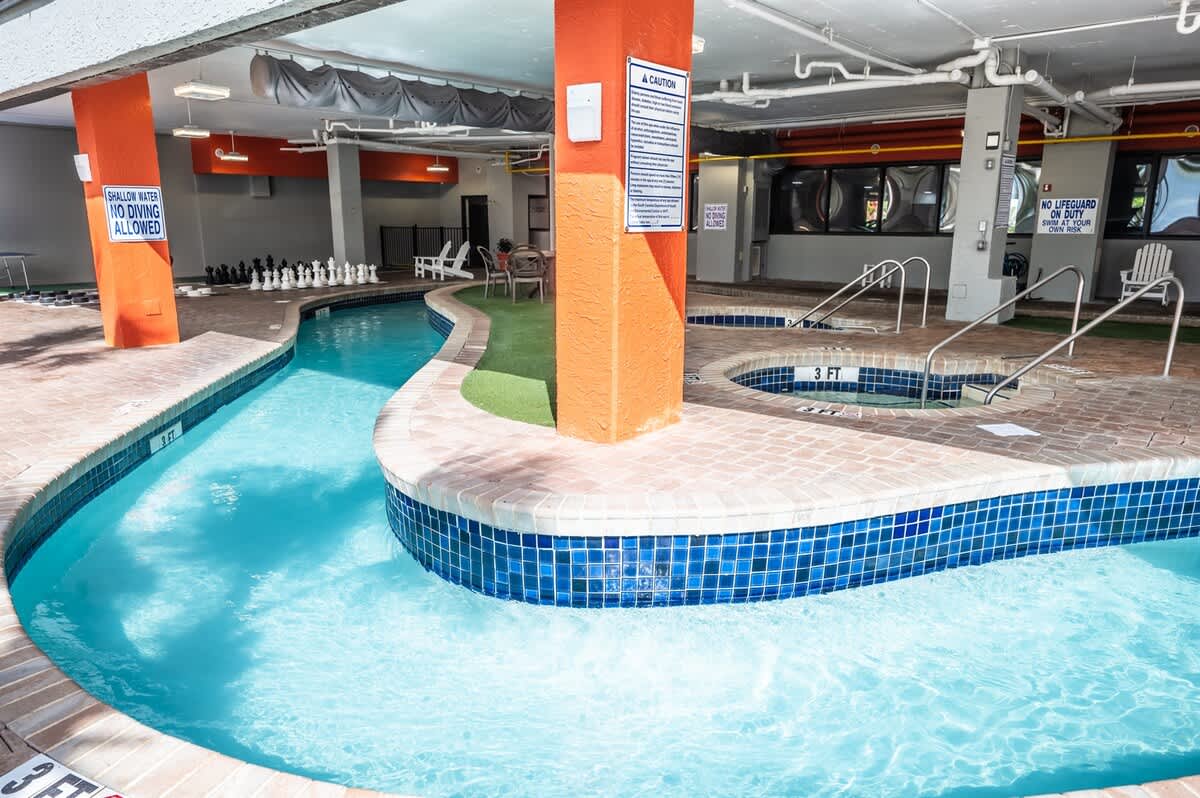 Heated indoor lazy river and whirlpool spa provide year round comfort with a relaxing resort atmosphere.