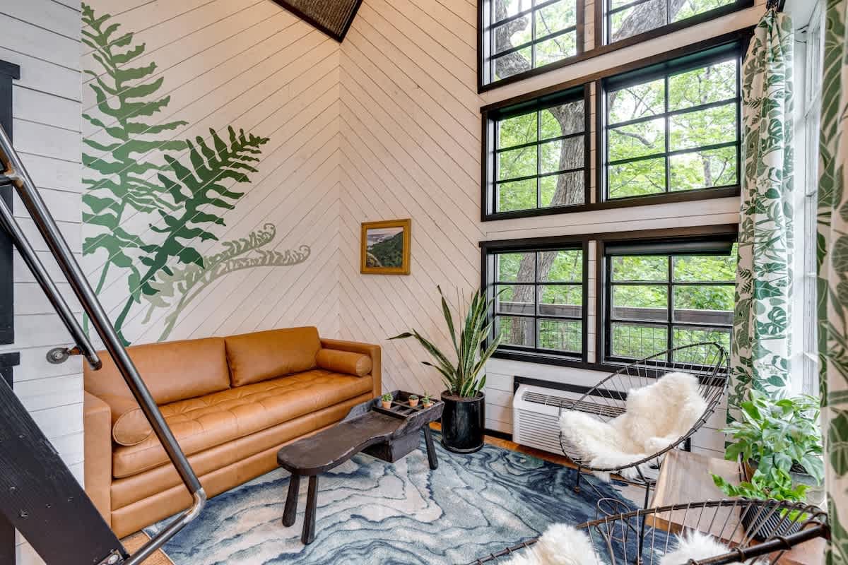 Enjoy floor to ceiling windows in the relaxing living space.