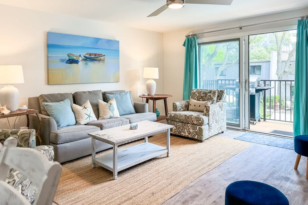 Living Area with Balcony and Pool Access