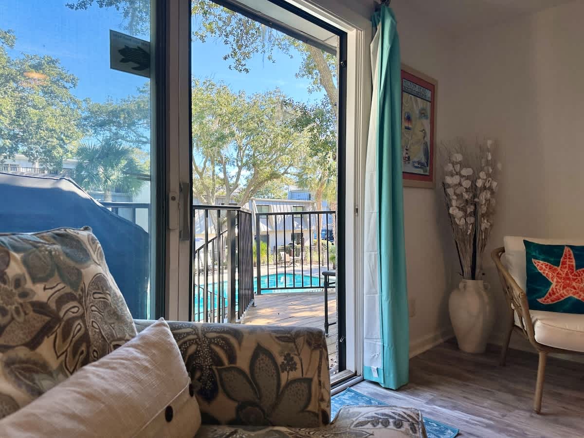 Living Area with Balcony and Pool Access