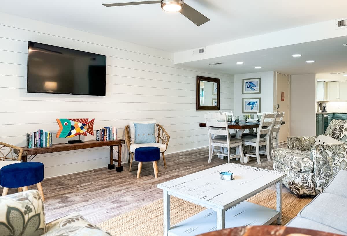 Living Area with Balcony and Pool Access