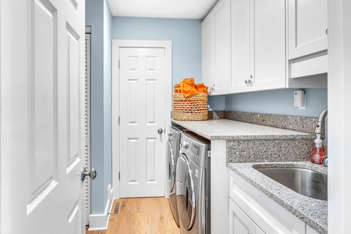 Your private laundry room features modern appliances and granite counters, making chores feel effortless during your stay.