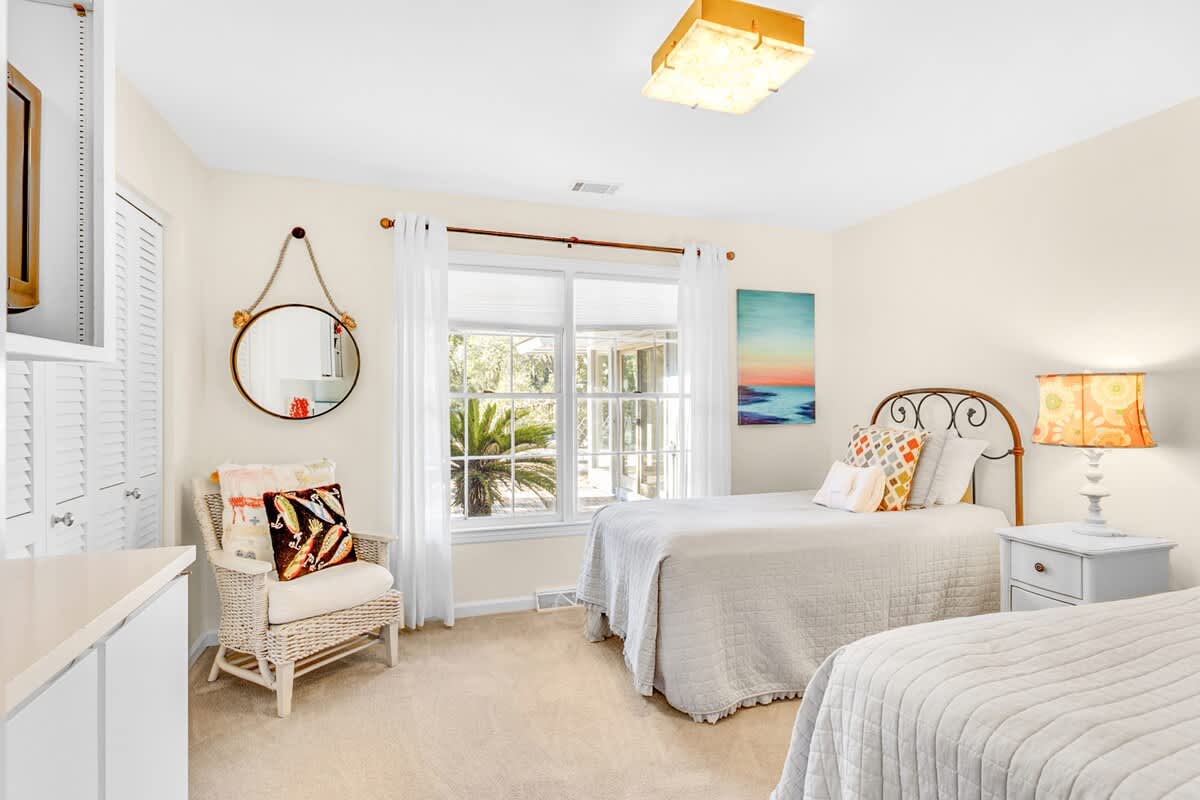 Wake up in your bright, coastal-inspired bedroom with twin beds and charming seaside décor that makes you feel instantly at home.