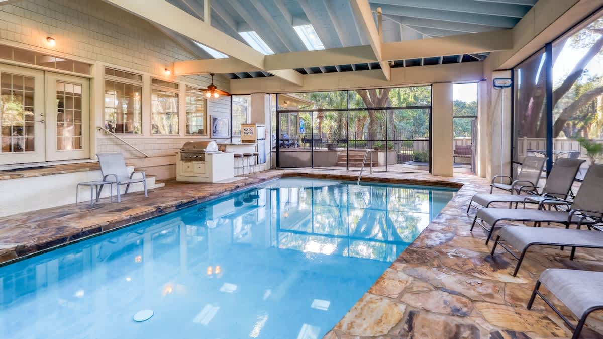 Screened in Pool and Spa Area with Grill Area (Pool and spa heat can be added for an additional cost)