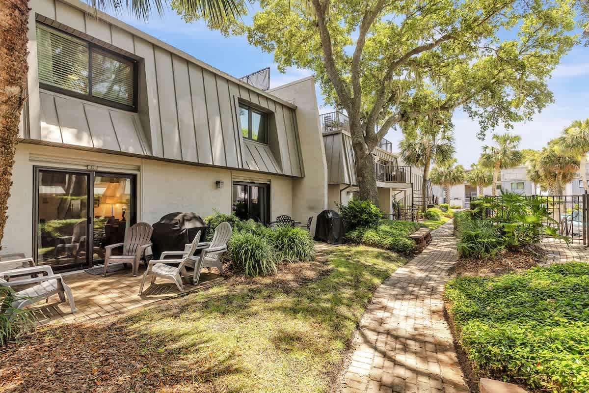 Private Patio Next to Community Pool and Walk to Beach