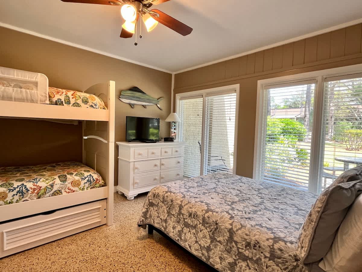 Ground Level Bedroom with Twin Bunks and Queen Bed