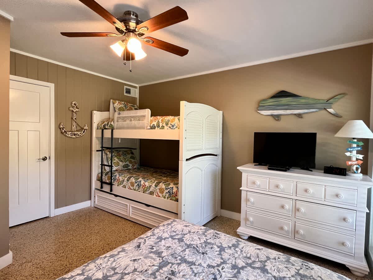 Ground Level Bedroom with Twin Bunks and Queen Bed