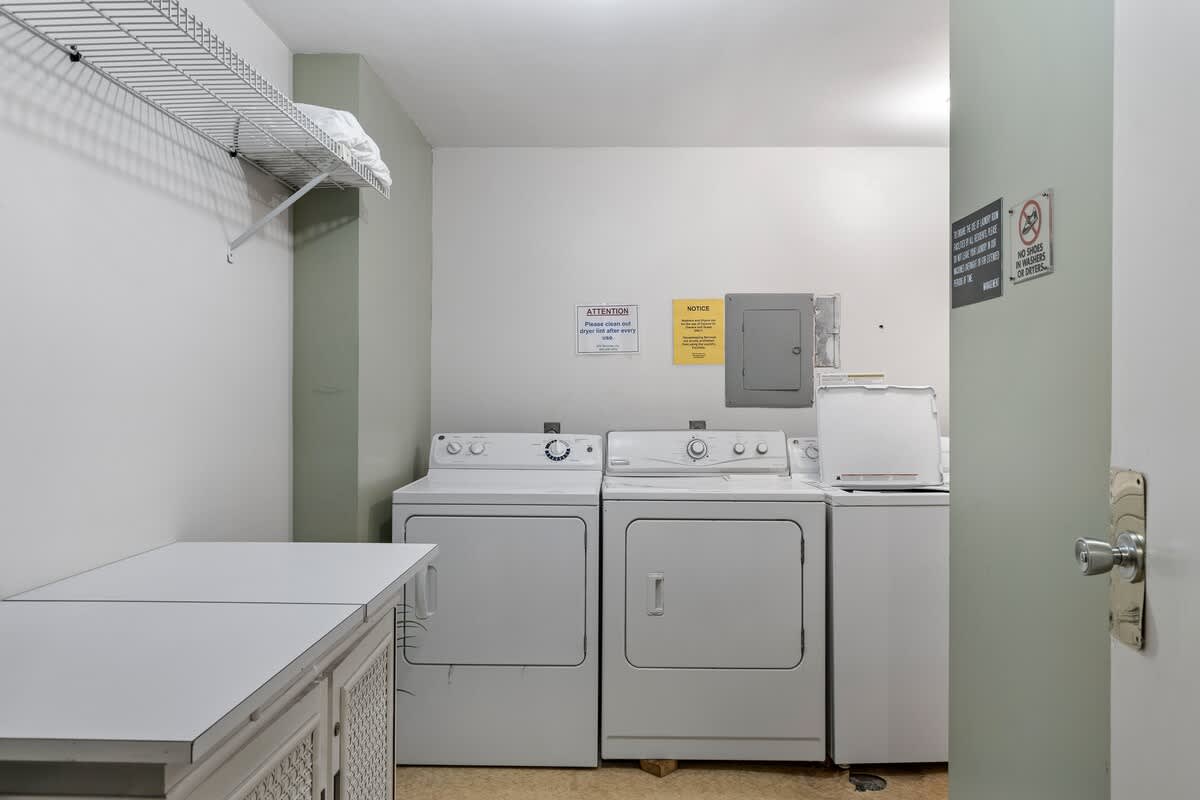 Shared Laundry Area Located in Hall Just Outside Door of 1035 CC
