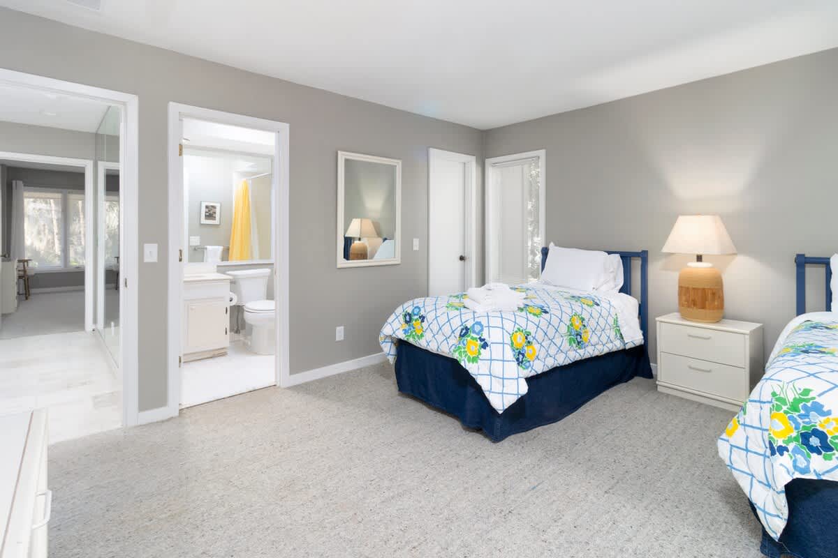 Guest Bedroom with Twin Bed and Access to Patio