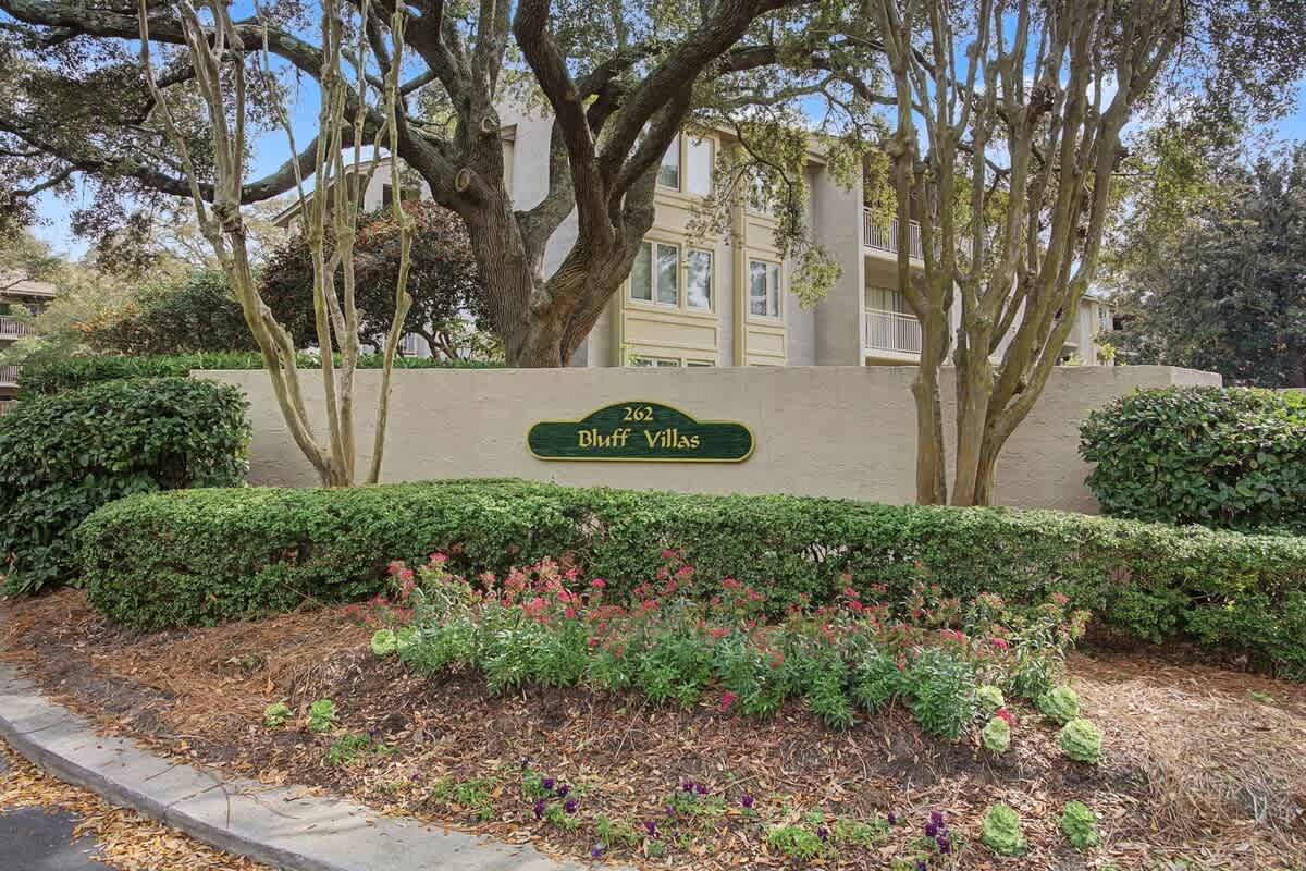 Welcome to Bluff Villas, where mature trees and manicured landscaping create a peaceful entrance to your home away from home.