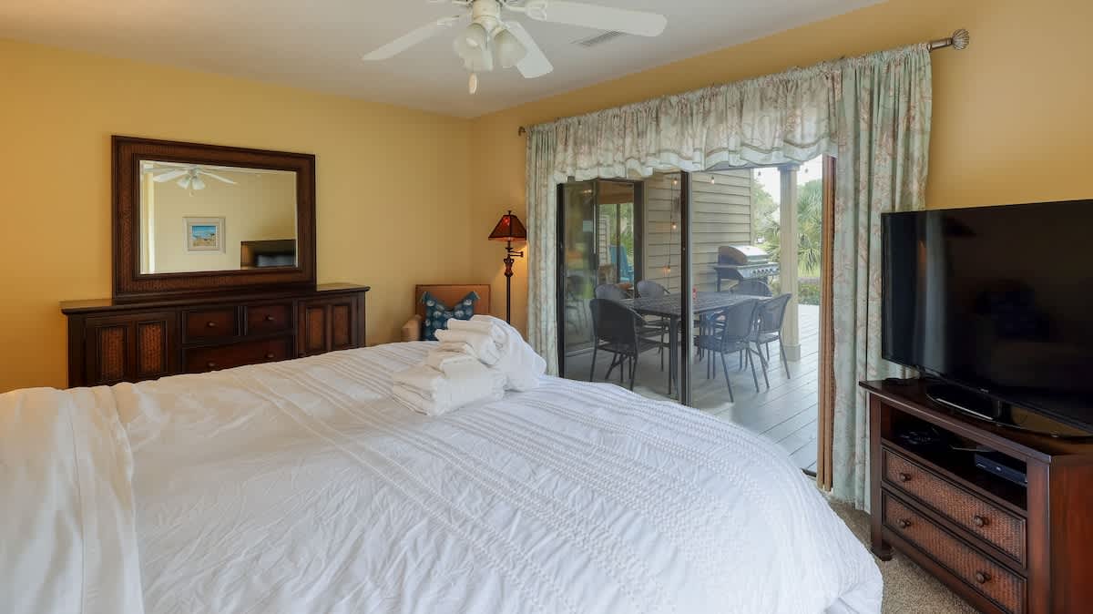 Downstairs Primary Suite with Golf Course Views