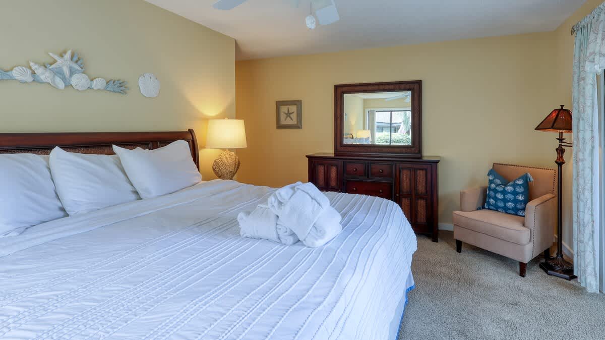 Downstairs Primary Suite with Golf Course Views