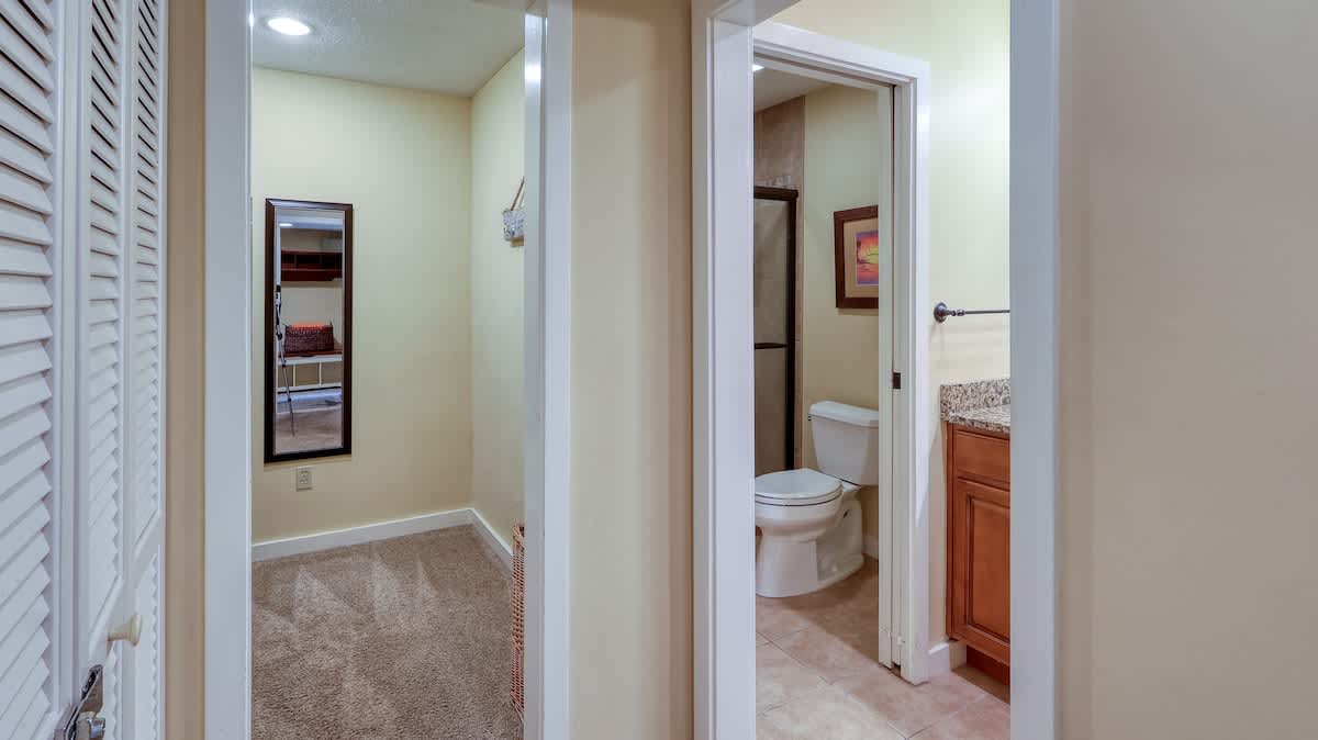 Downstairs Primary Suite Closet and Bathroom
