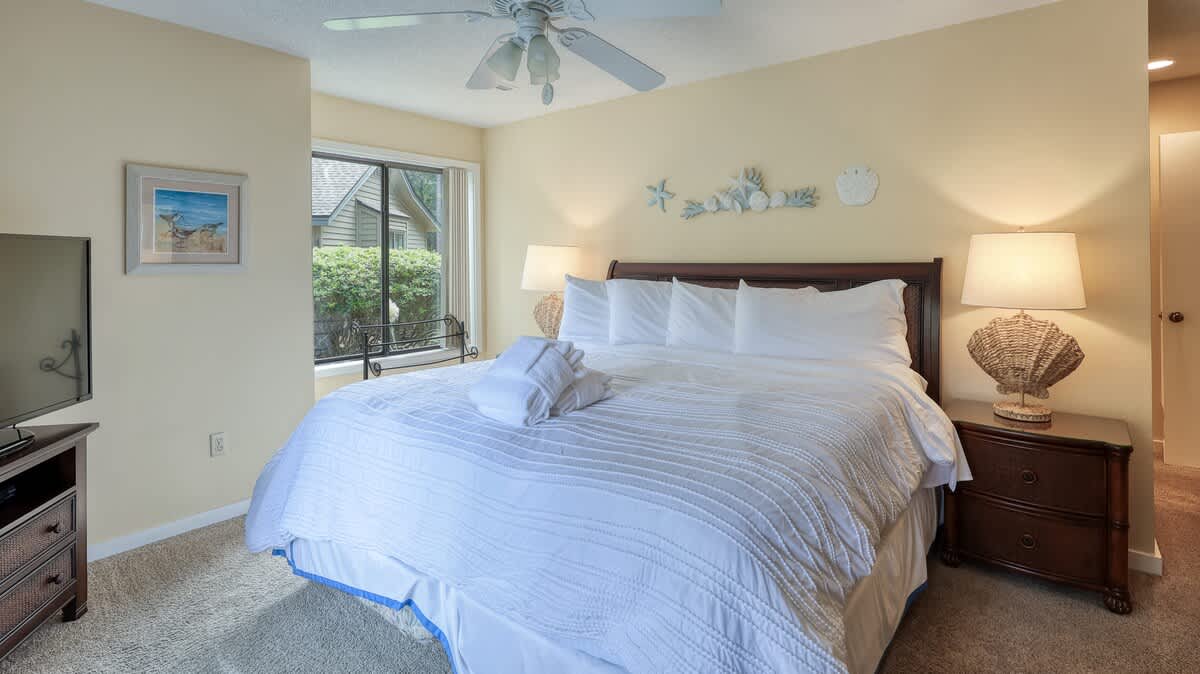 Downstairs Primary Suite with Golf Course Views
