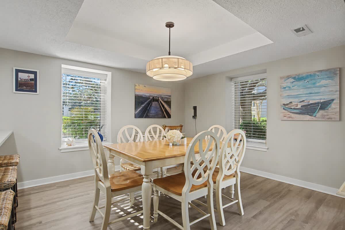 Gather around this elegant dining table where delicious meals and cherished memories await you and your loved ones.