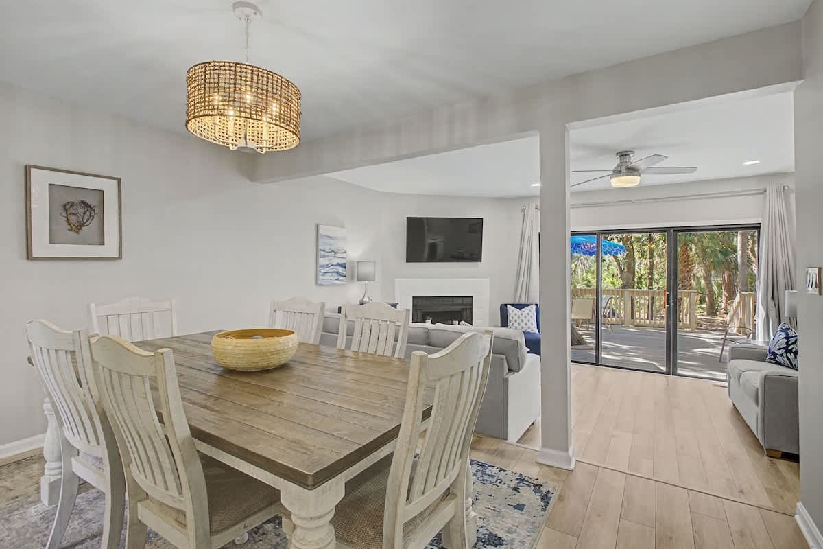 Gather around your beautiful dining table where coastal charm meets modern comfort, perfect for memorable meals together.