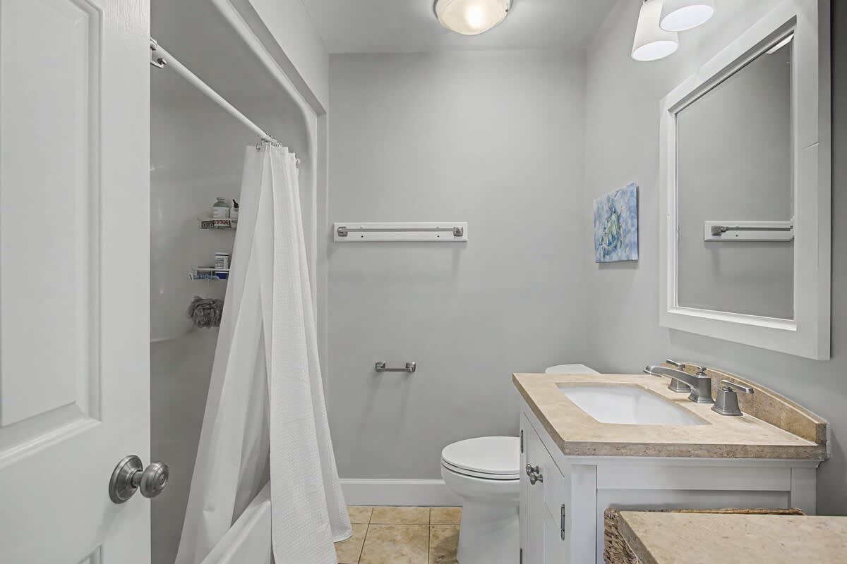 Refresh in your private bathroom with elegant marble counters, fluffy towels, and modern fixtures designed for your comfort.