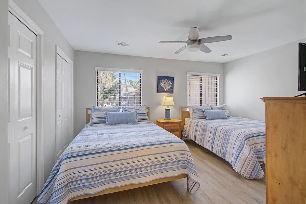 Drift off peacefully in your bright, comfortable twin bedroom with coastal-inspired decor and soothing ocean views.