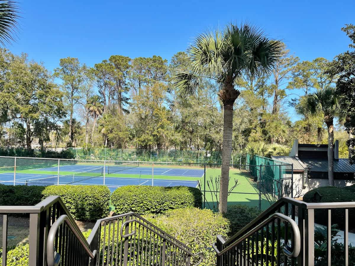Community Tennis Courts next to the Community Pool