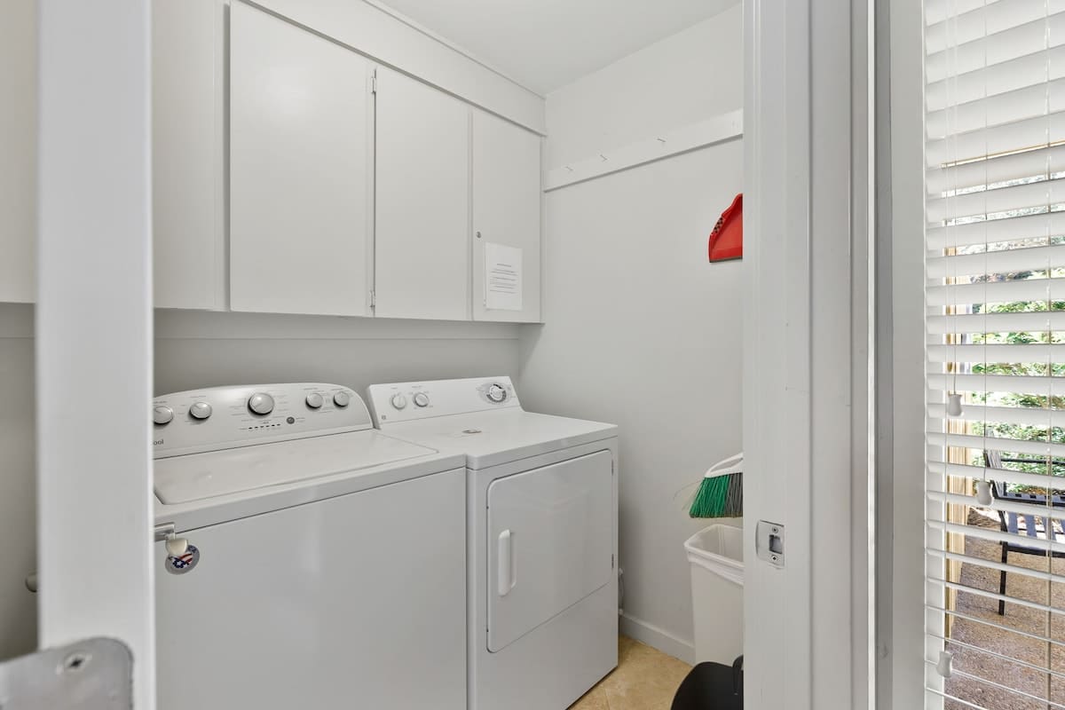 Your dedicated laundry room keeps your vacation wardrobe fresh with full-size washer and dryer, plus ample storage space.
