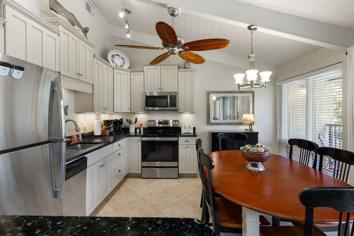 Your fully-equipped kitchen features granite counters, stainless appliances, and cozy dining nook for memorable meals together.